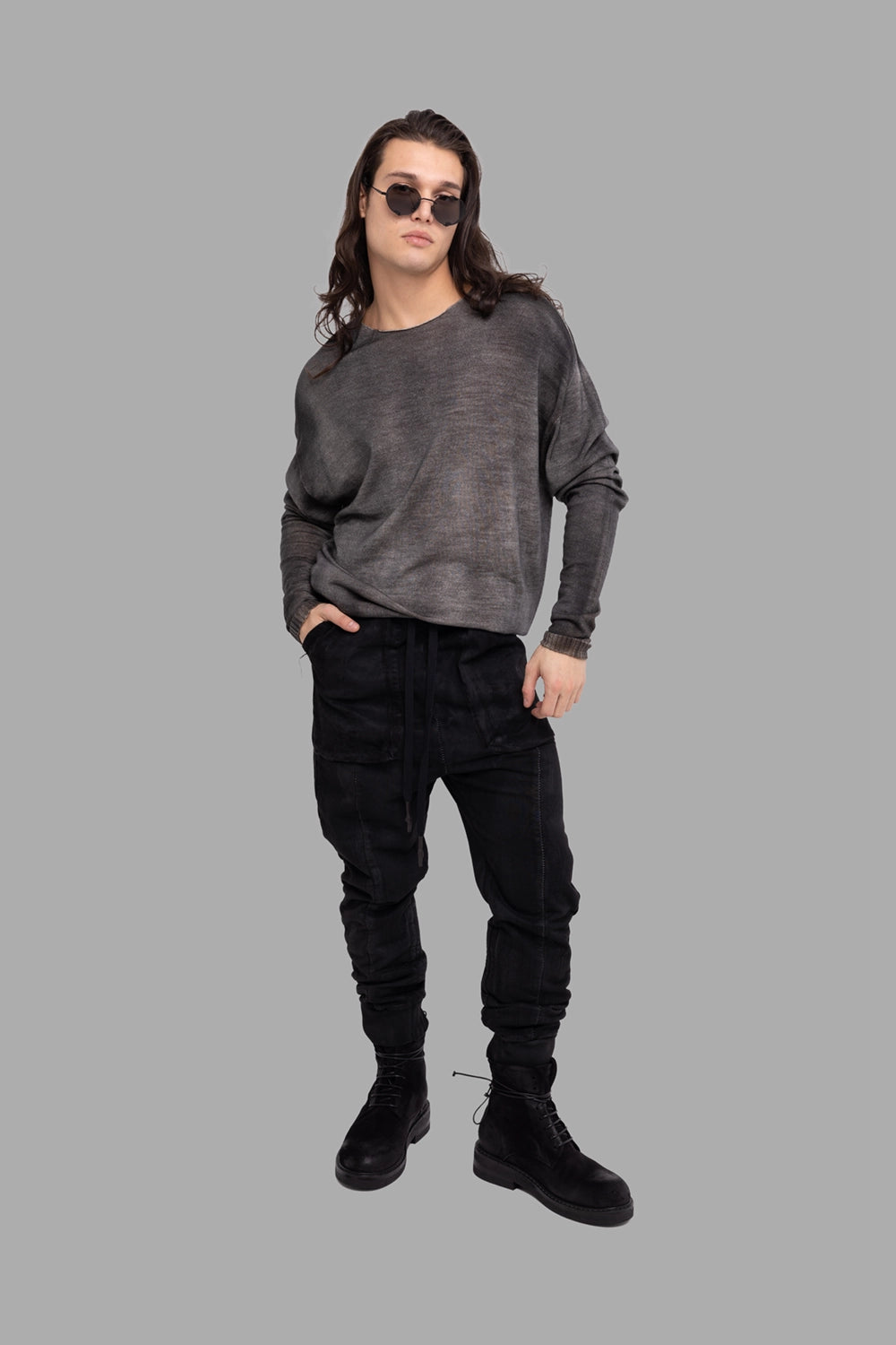 MD75 men’s coated drop-crotch sweatpants in black, on-model full length, oversized front patch pockets.