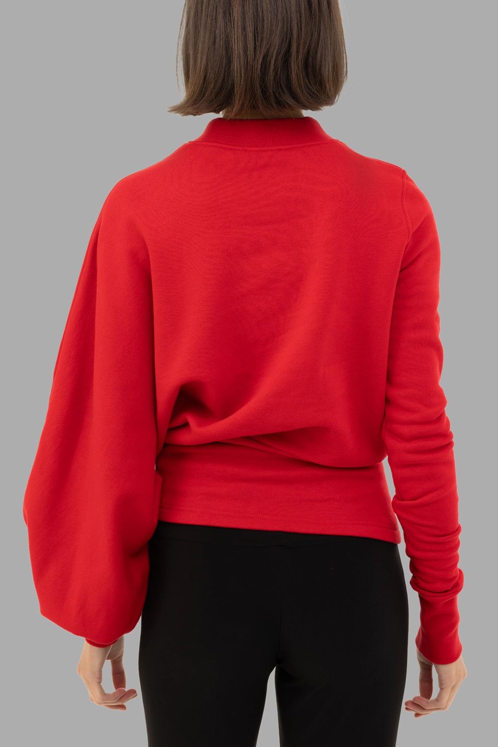 A.W.A.K.E. MODE women's sweatshirt in red, back view, draped side and balloon sleeve volume