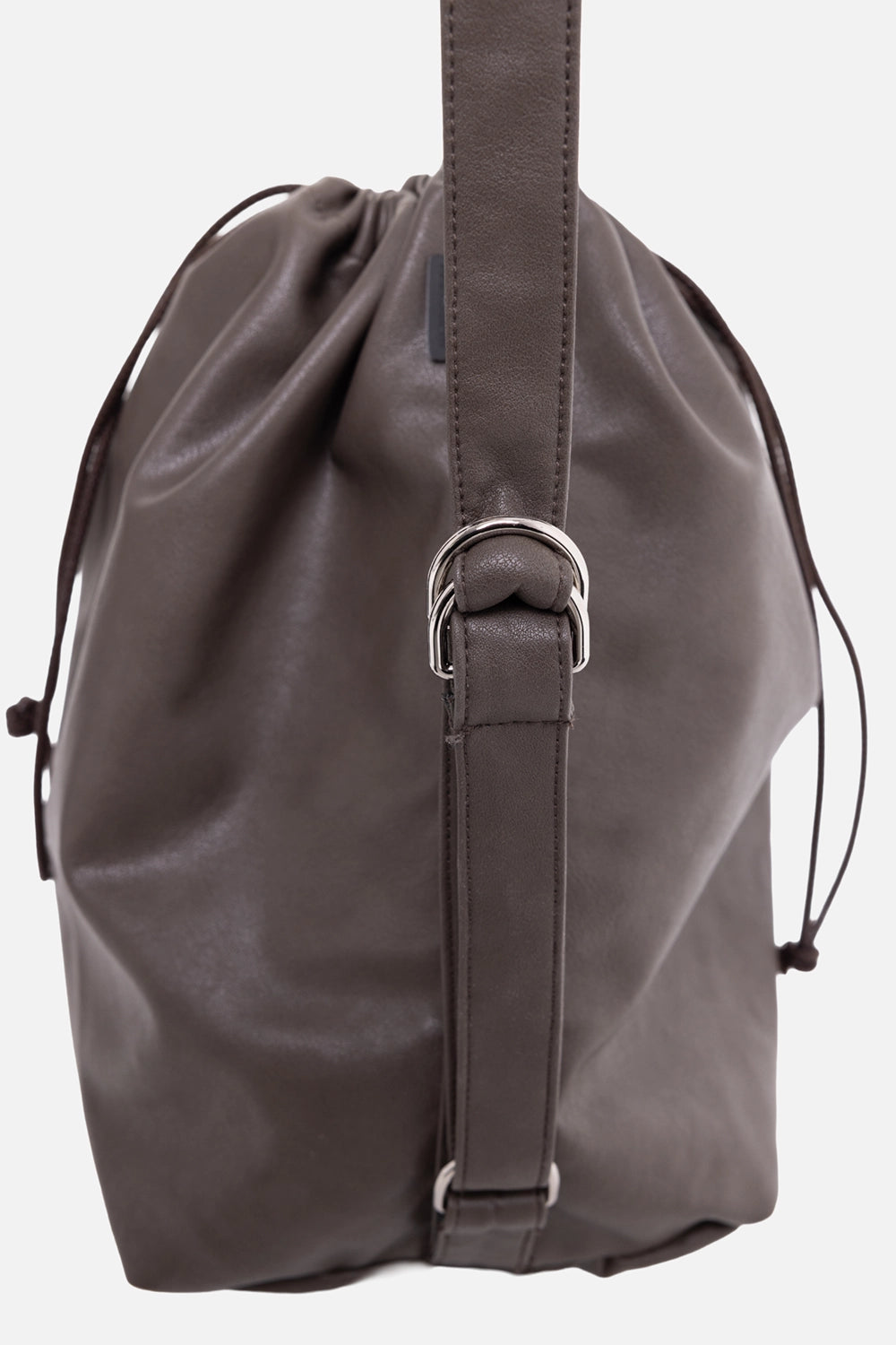 ATTACHMENT bucket bag in brown, side detail with silver ring adjuster and smooth coated finish