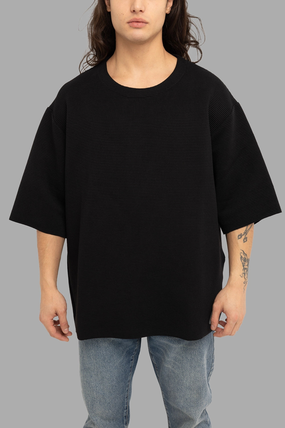 Gaelle Paris men’s t-shirt in black, front view, crewneck, horizontal ribs and dropped shoulders