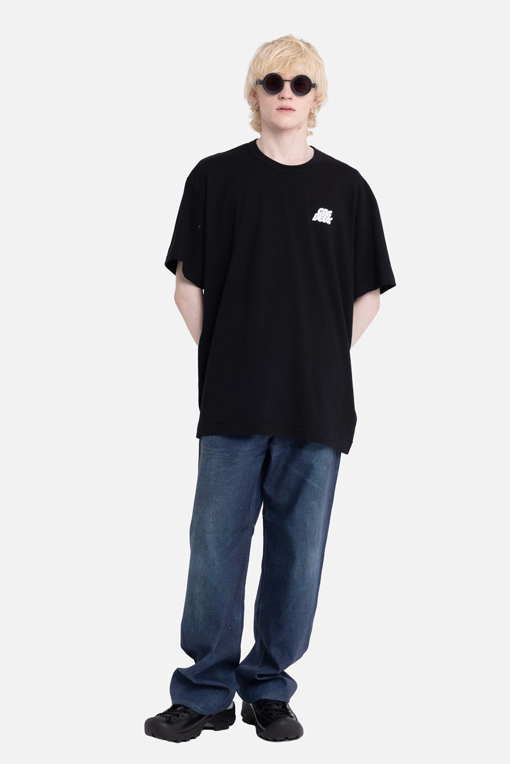 COMME des GARÇONS HOMME DEUX men's T-shirt in black, on-model full-length, white chest logo and crew neck