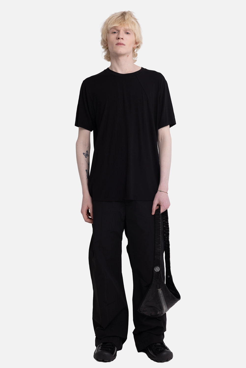 La Haine Inside Us men's T-shirt in black, on-model full-length, front seams with relaxed drape