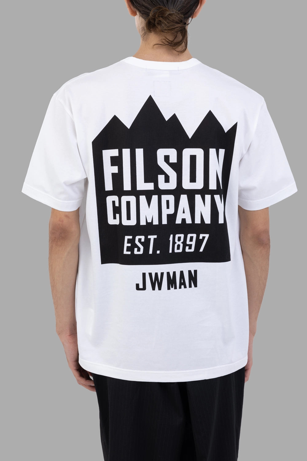 Junya Watanabe T-shirt in white, back view, large FILSON COMPANY graphic with JWMAN