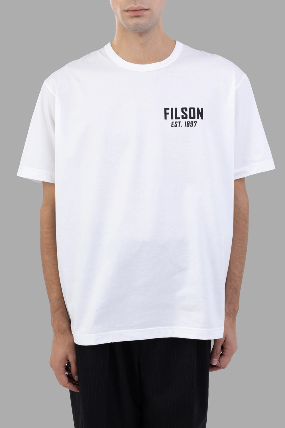 Junya Watanabe T-shirt in white, front view, small FILSON chest print