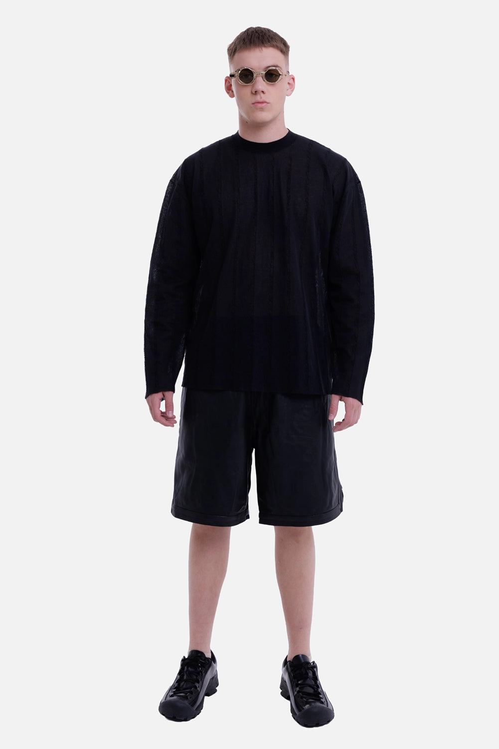 Justin Gall men's black tailored shorts, full-length model view with elasticated waist and knee-length cut