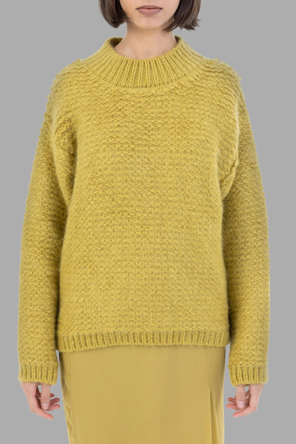Gentry Portofino women textured knit sweater in Oliva, front view, ribbed mock neck, drop shoulders, ribbed hem
