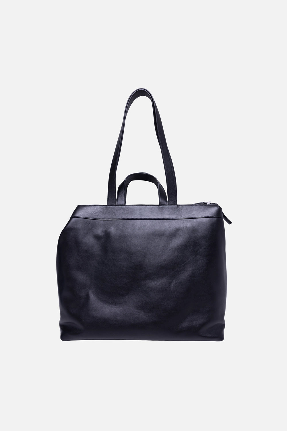Marsèll unisex tote bag in black, back view, long straps draped over front with top zip closure