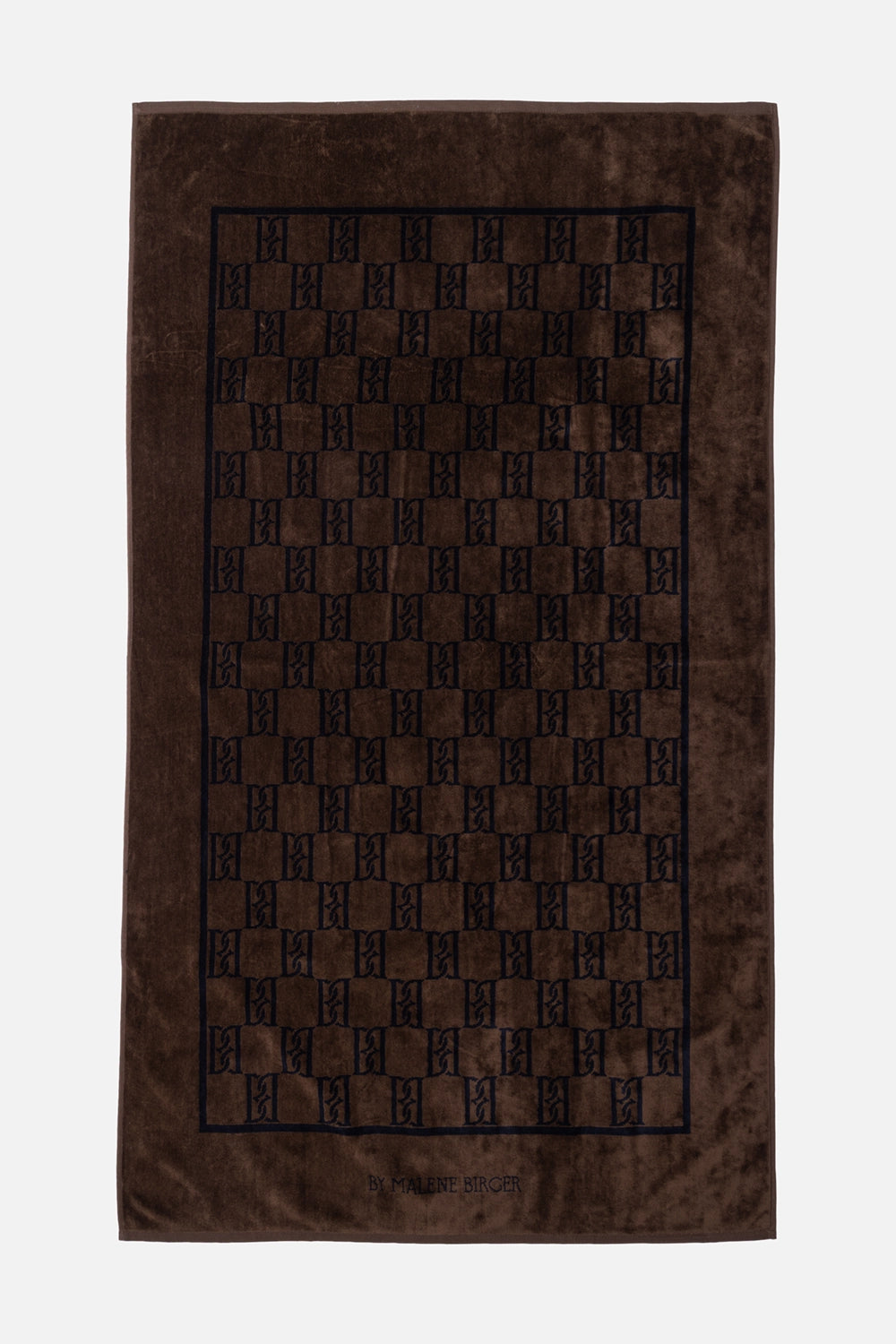 By Malene Birger towel in Dark Mahogany, front view, all-over monogram with framed border