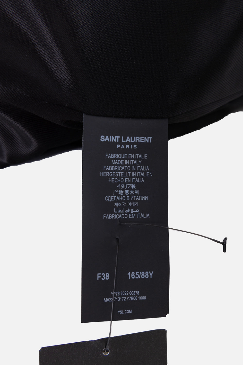 Pre-owned Saint Laurent women’s trench coat in black, tag close-up, size F38 and made in Italy label