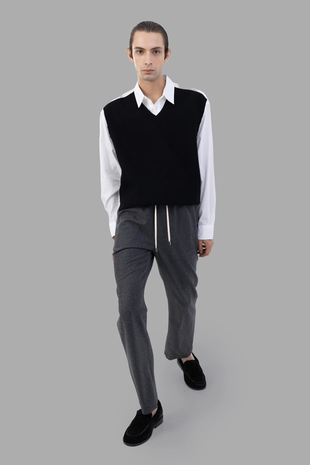 AION trousers in anthracite, on-model full length, straight-leg silhouette