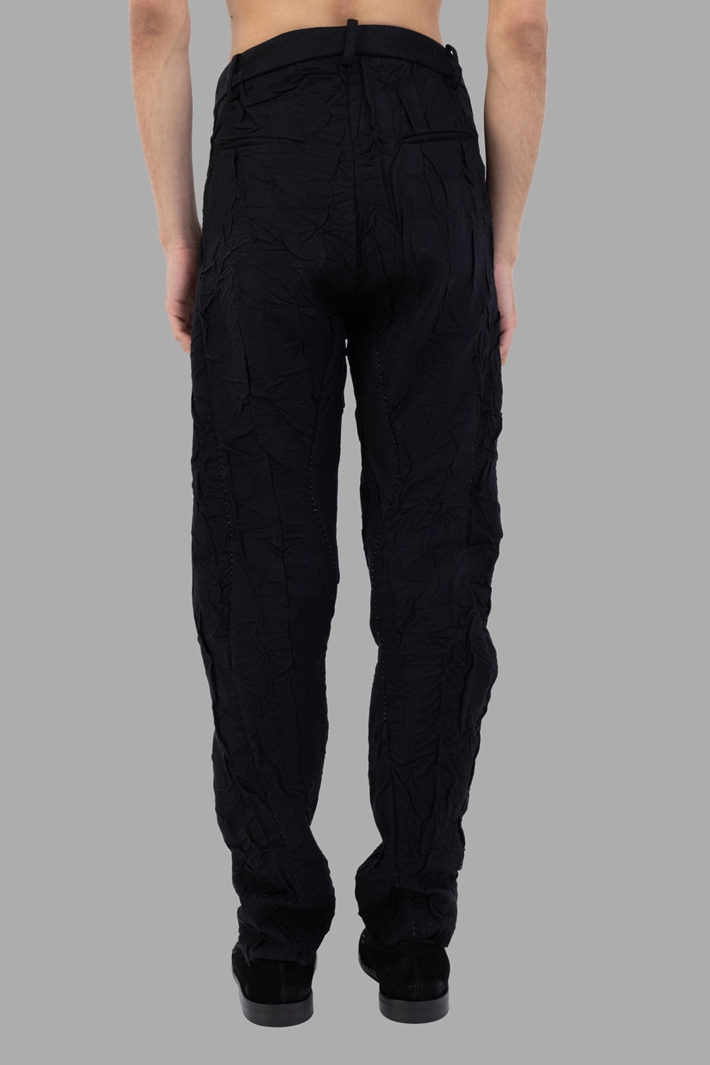 Masnada slim trousers in black, back view, single welt pocket and shaped seams
