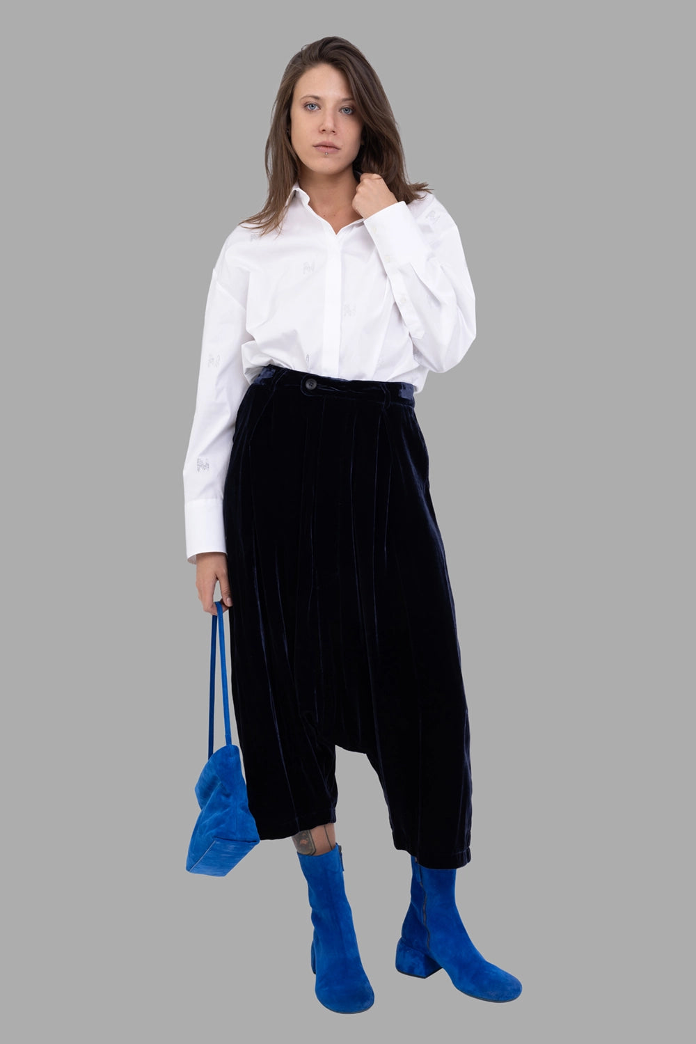 Marc Point women's velvet drop-crotch trousers in black, on-model full length, plush sheen and tapered cropped leg