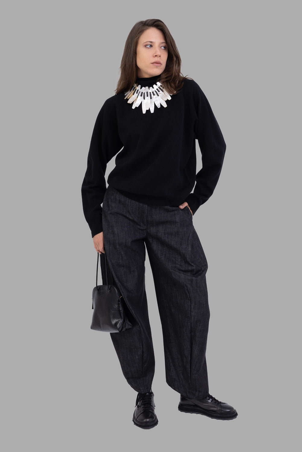 Giovanni Cavagna women's trousers in black, on-model full length, relaxed tapered leg