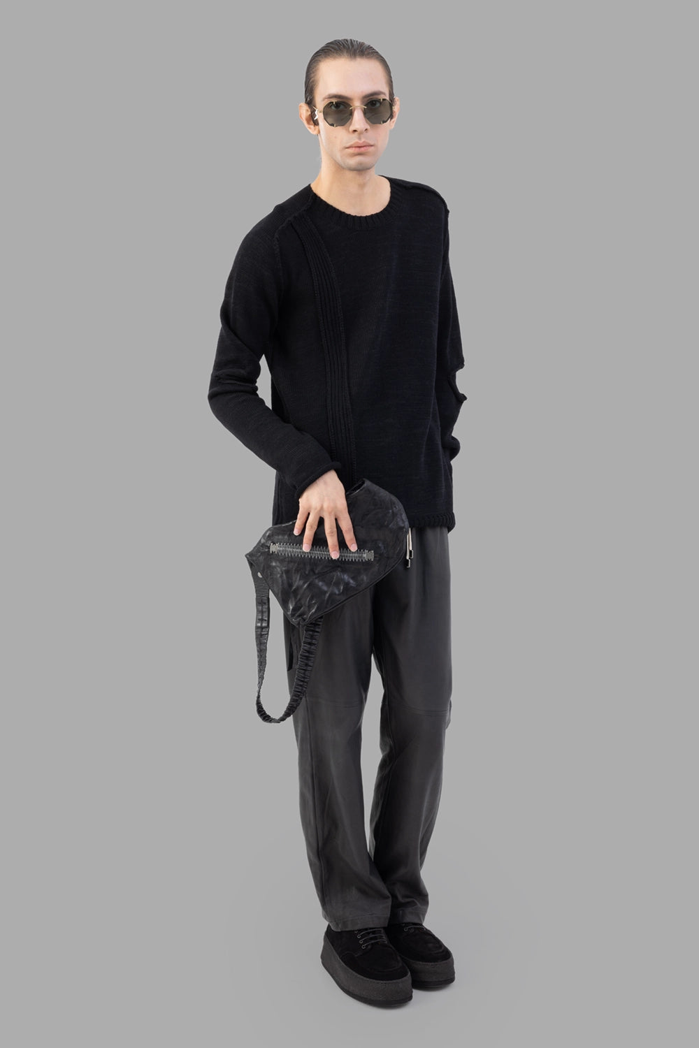 AION leather trousers in black, on-model full length, relaxed straight leg