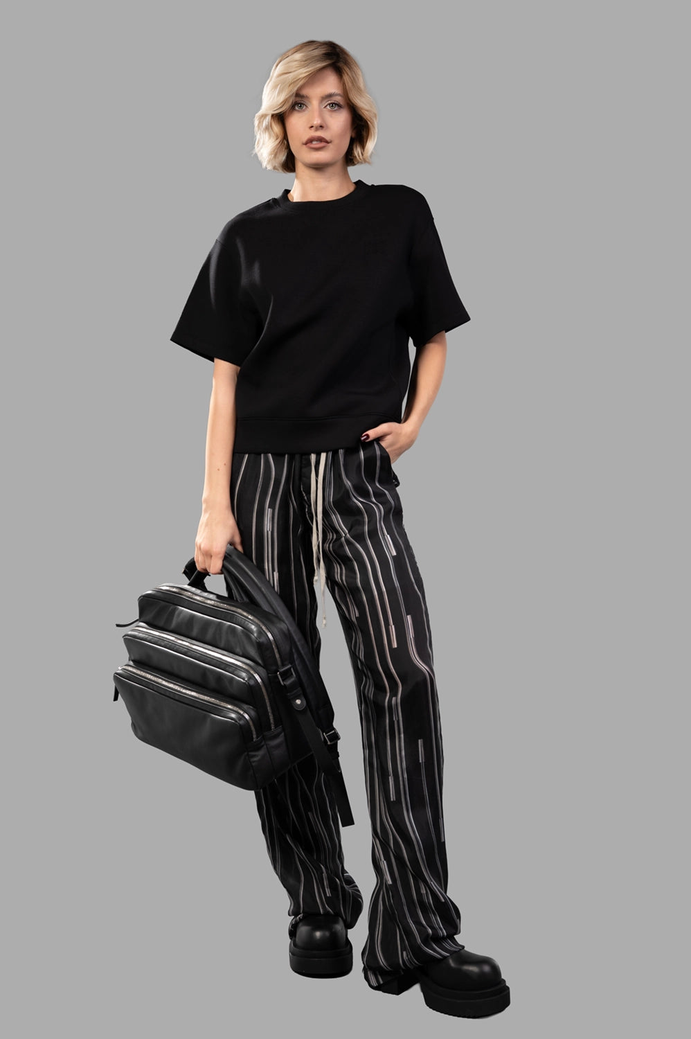 Rick Owens trousers in Black/Pearl, on-model full length, loose straight leg with signature drawstring waist.