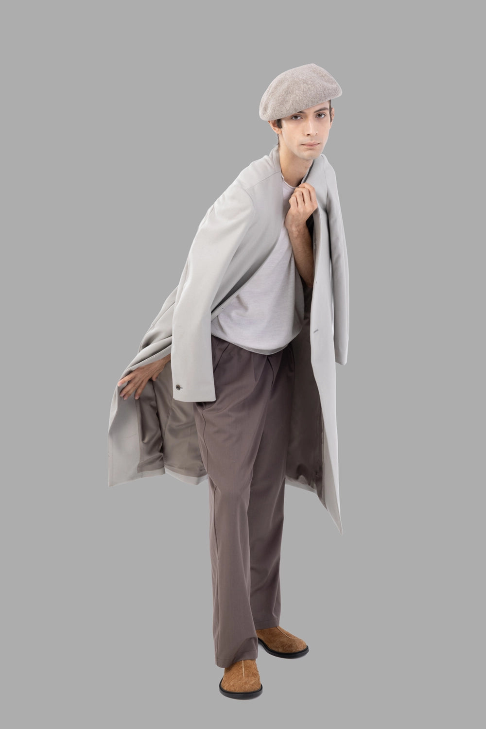 Attachment trousers in khaki gray, on-model full length, relaxed wide leg