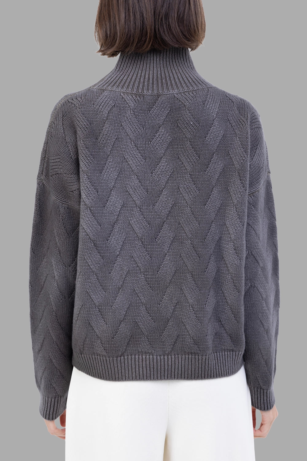 GentryPortofino women's turtleneck sweater in Mastice, back view, chevron pattern with raglan sleeves and ribbed hem