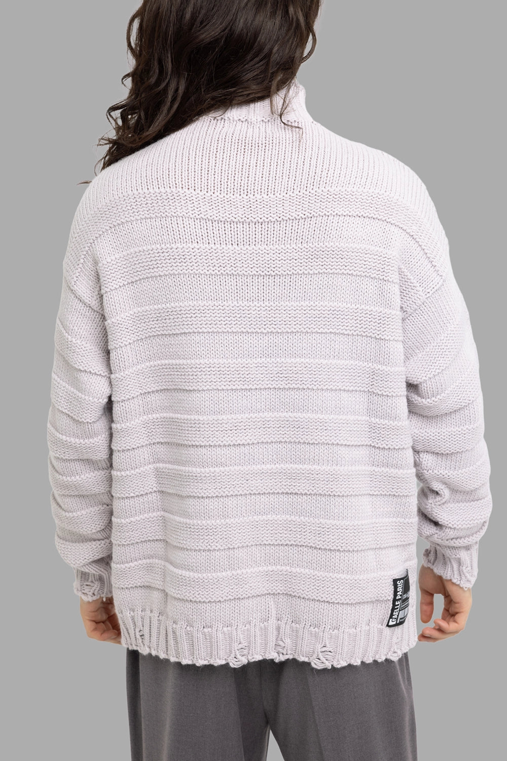 Gaëlle Paris men’s turtleneck sweater in off-white, back view, logo patch at hem and banded knit