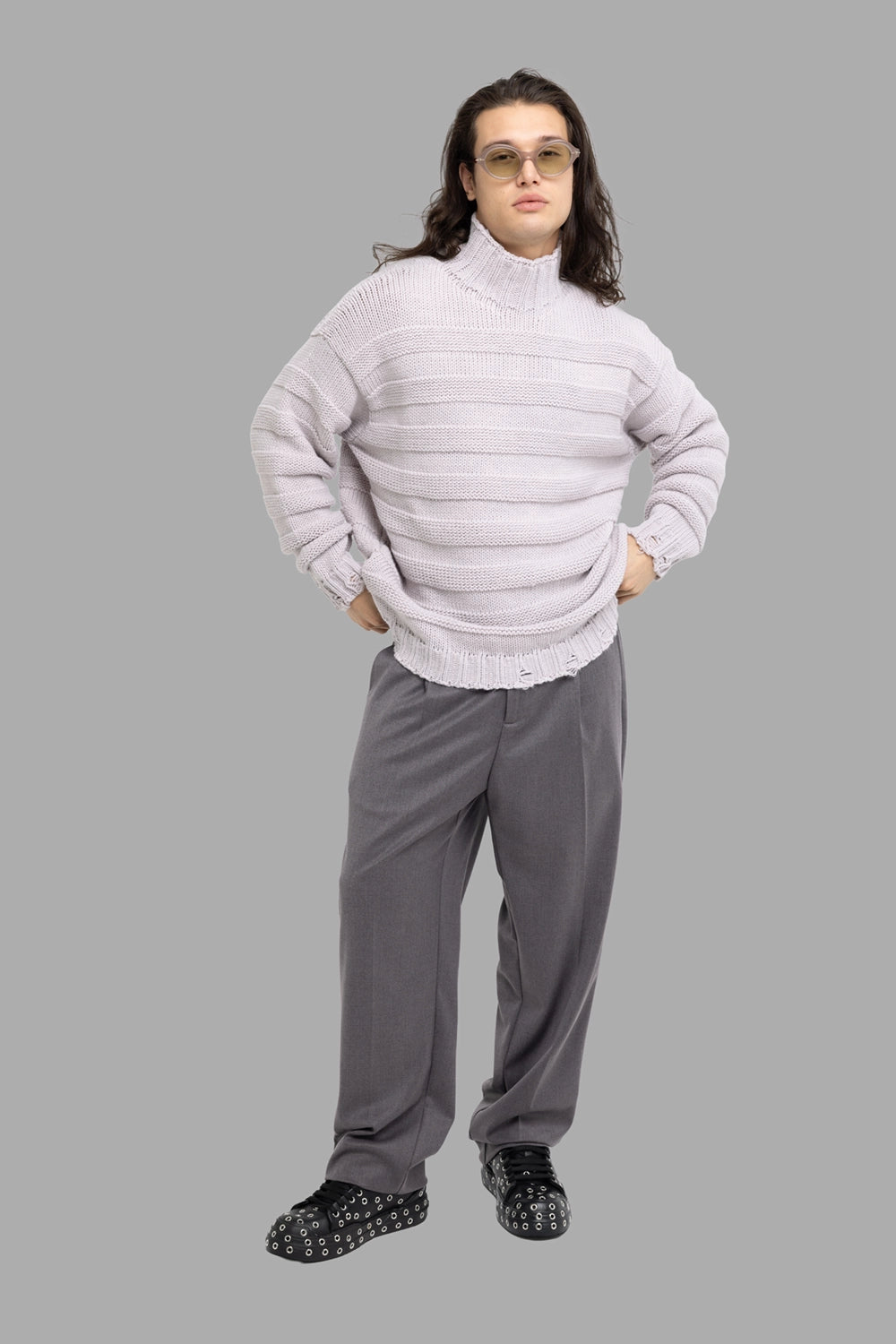 Gaëlle Paris men’s turtleneck sweater in off-white, on-model full length, frayed hem and relaxed oversized fit