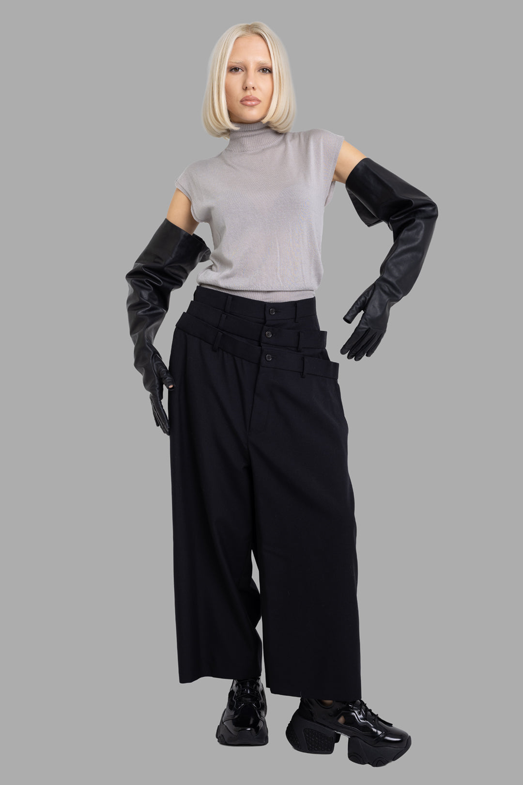Rick Owens women's pearl sleeveless turtleneck top, on-model full length, cap shoulders and ribbed waistband