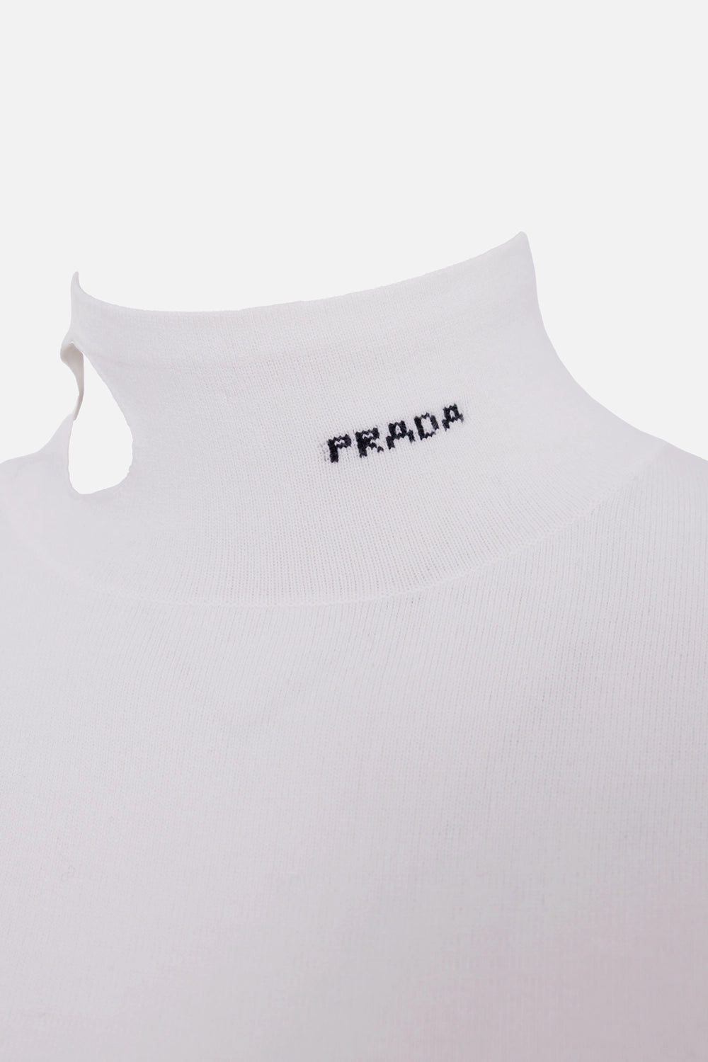 Prada turtleneck top in white, logo detail, black logo on high neck with side cutout