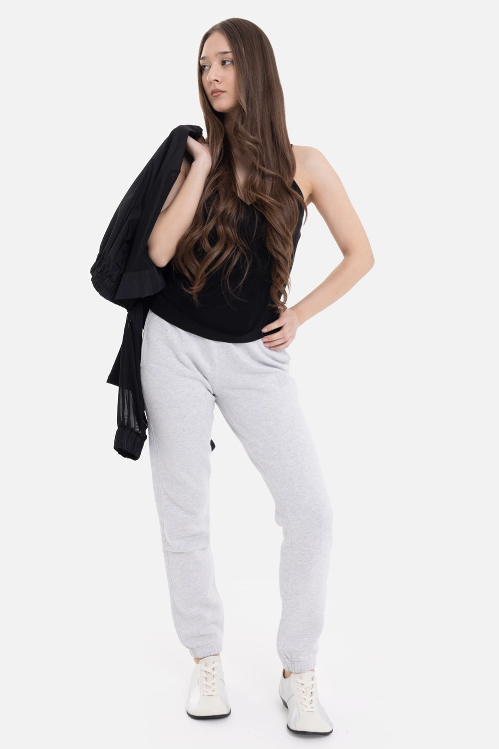 Norma Kamali women's slip top in black, on-model full-length view, V-neckline and straight hem