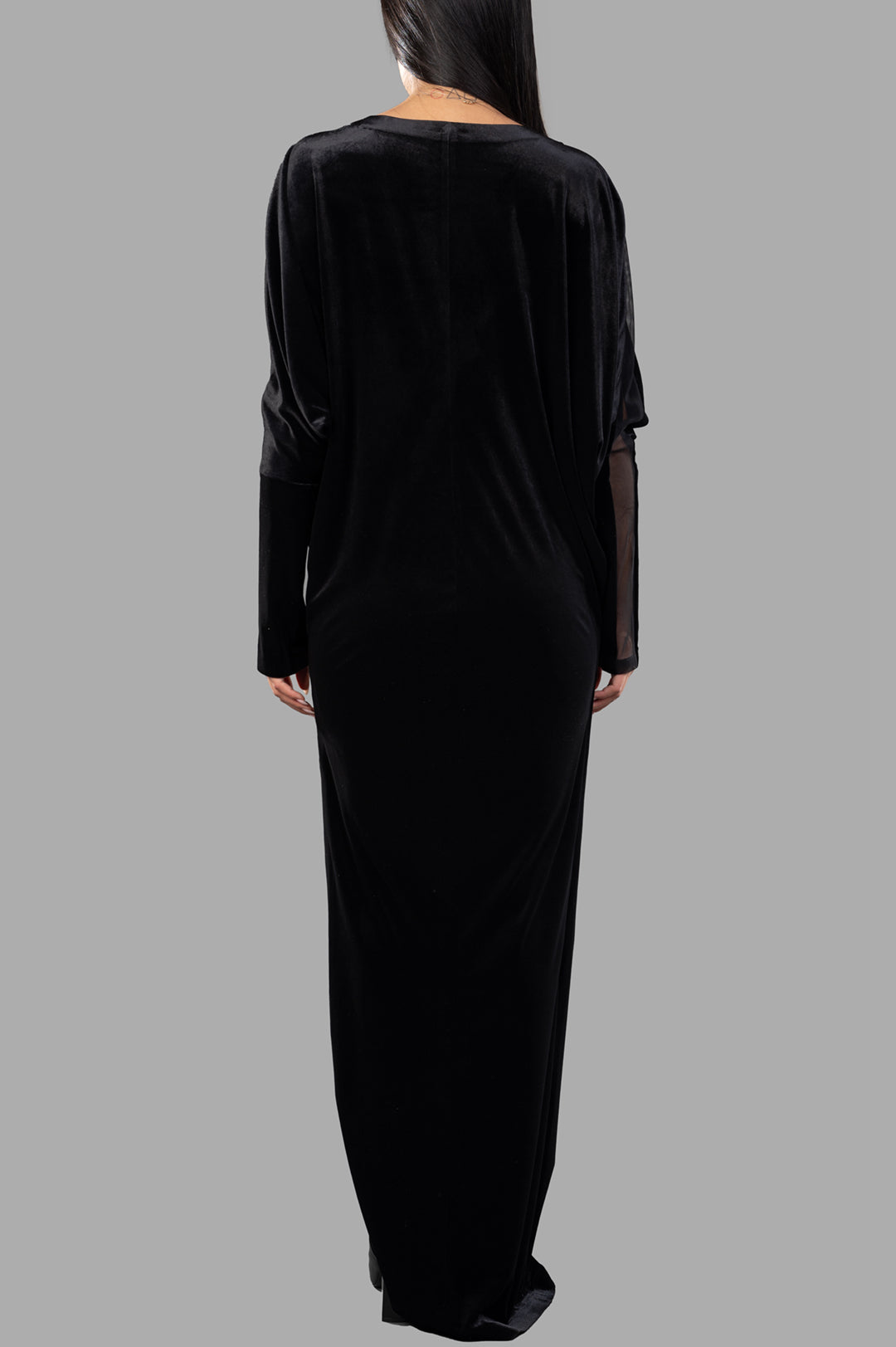 Norma Kamali Dolman Wrap Gown in black, showcasing back view with elegant long sleeves and soft texture.