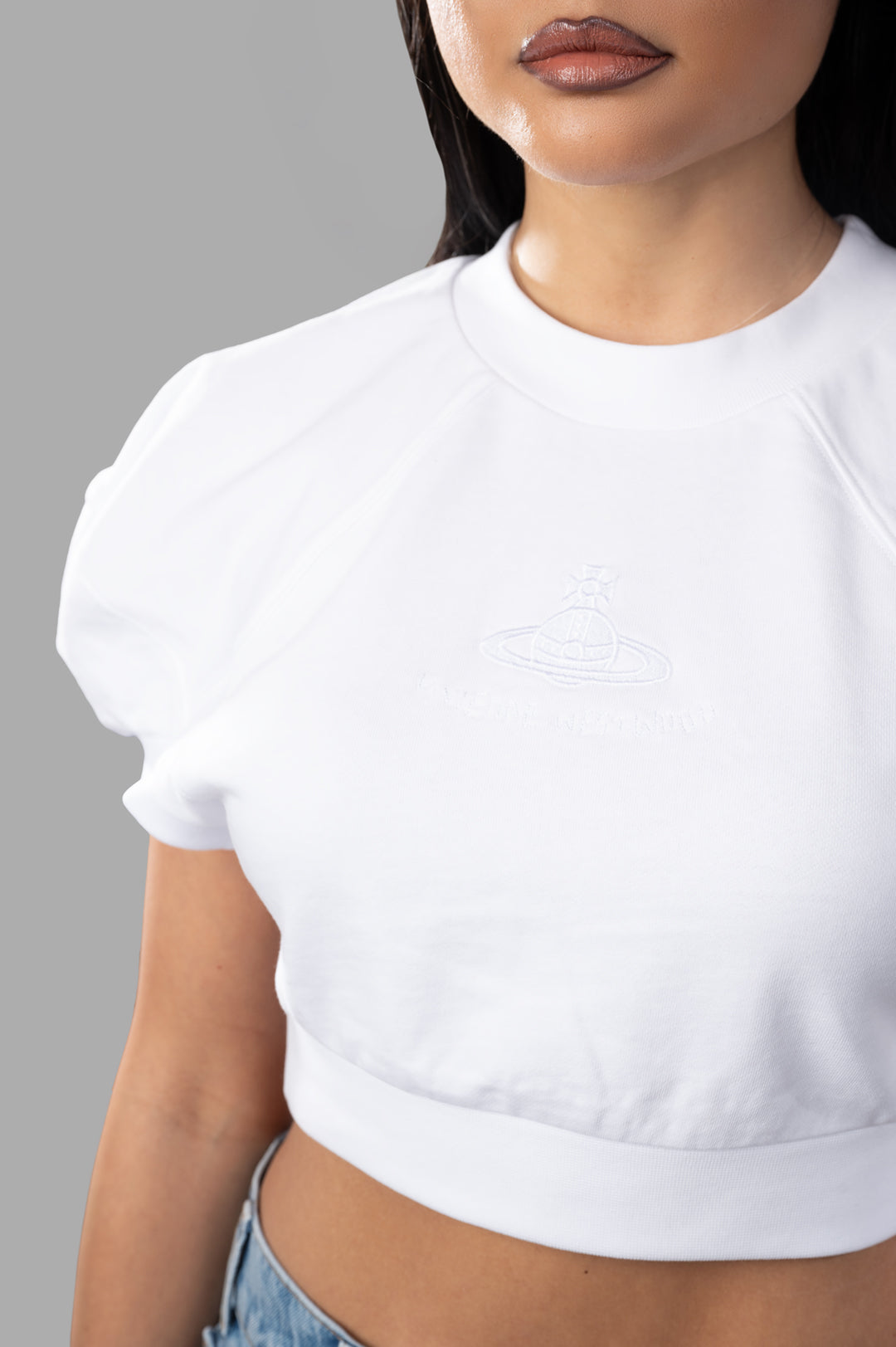 Vivienne Westwood Cropped Football Sweatshirt featuring voluminous shoulders, ribbed details, and a stylish cropped fit.