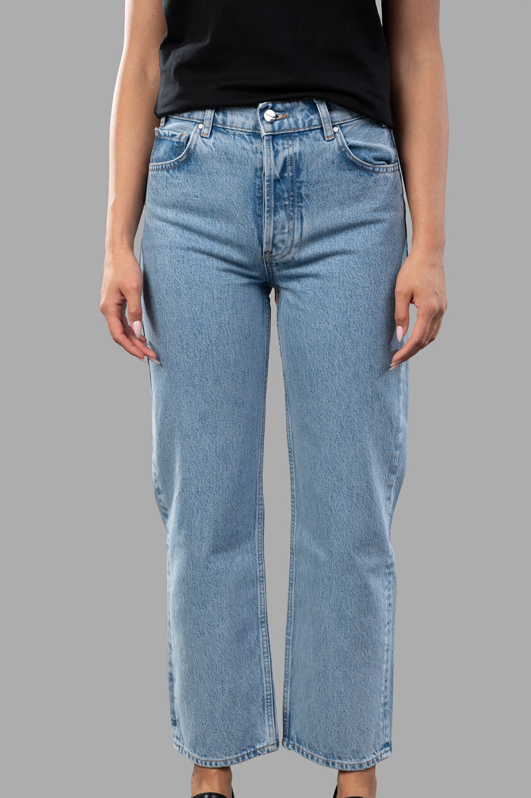 Anine Bing Gavin Jeans in blue, featuring a relaxed-straight fit and cropped hem, modeled for a stylish look.