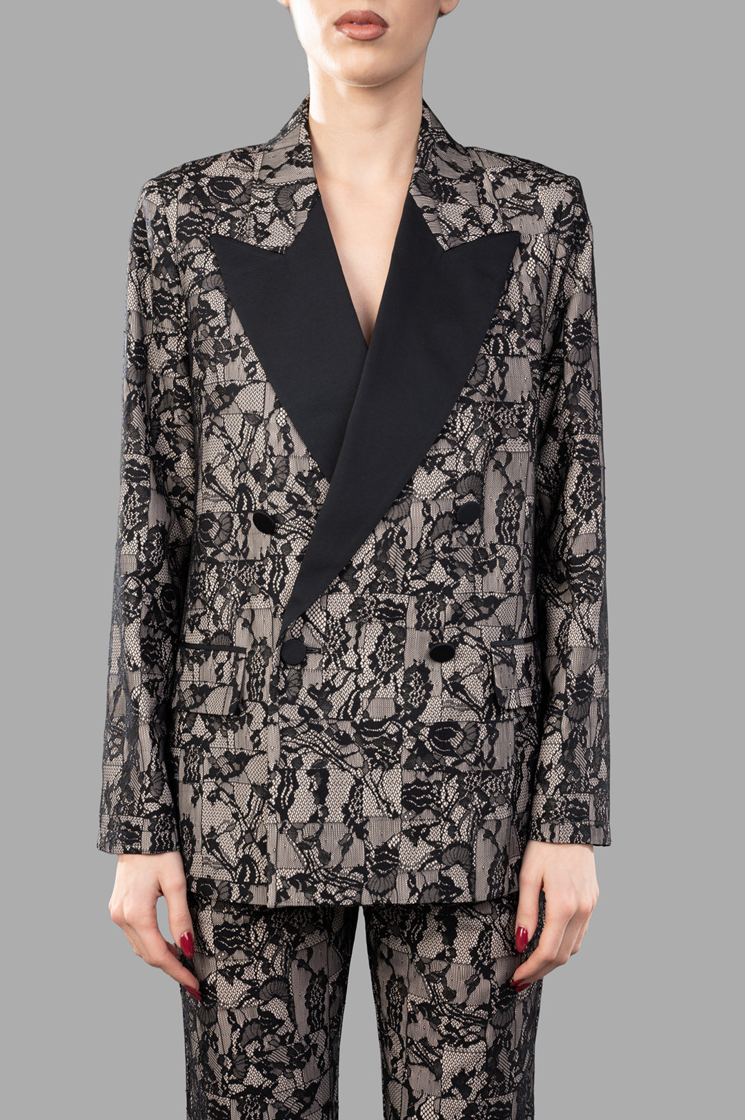 Joseph Patchwork Lace Jacket displayed on model, featuring a double-breasted design with modern lace pattern.