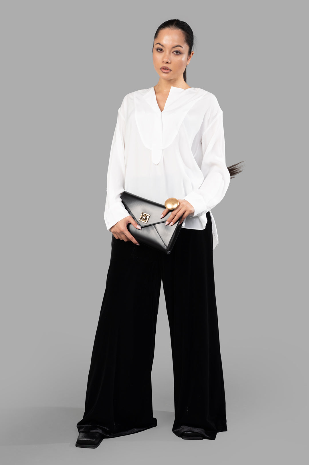 By Malene Birger Fayette Silk-blend Shirt, white, on-model front view, styled with black pants, holding clutch.
