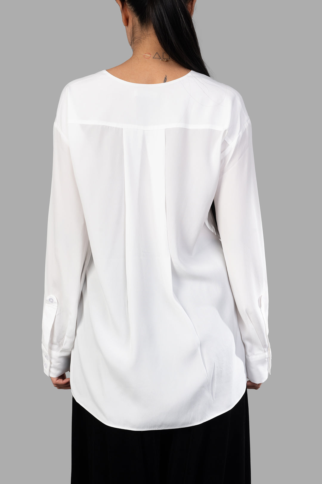 By Malene Birger Fayette Silk-blend Shirt shown from the back, featuring a soft white fabric and elegant tunic silhouette.