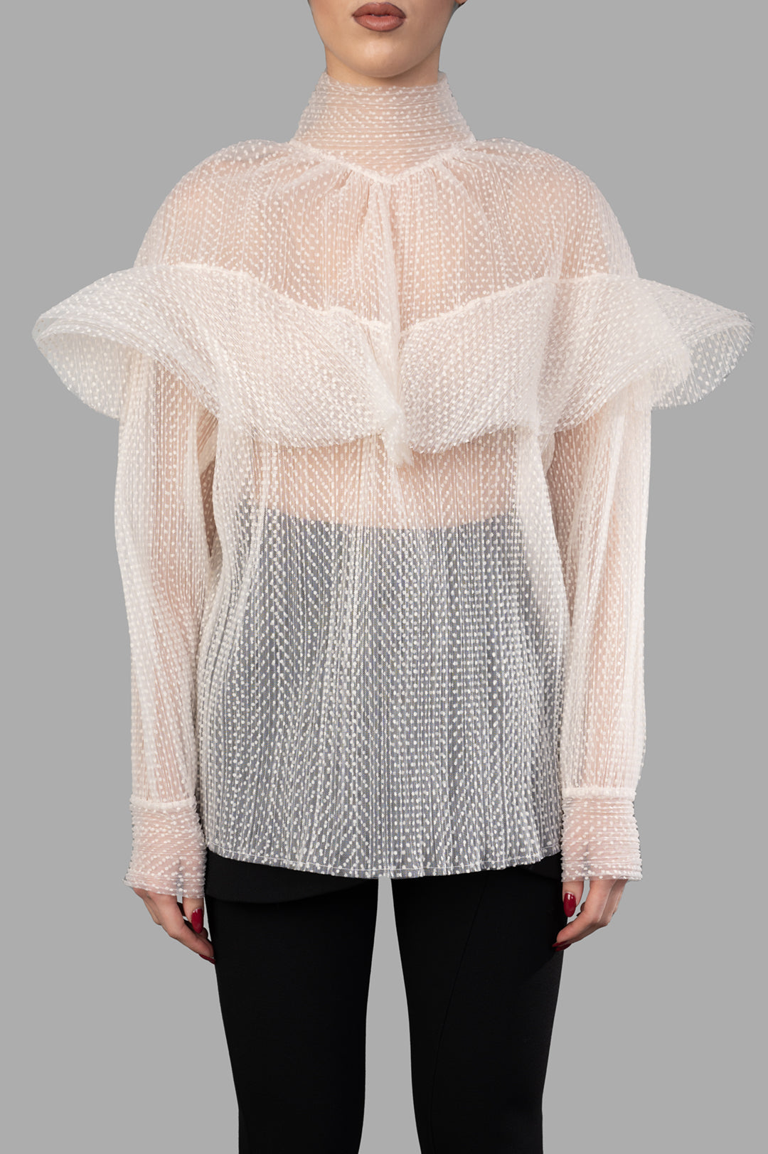 A.W.A.K.E. MODE Double Layered Tulle Top featuring textured details, frill accents, and a high neckline on-model.