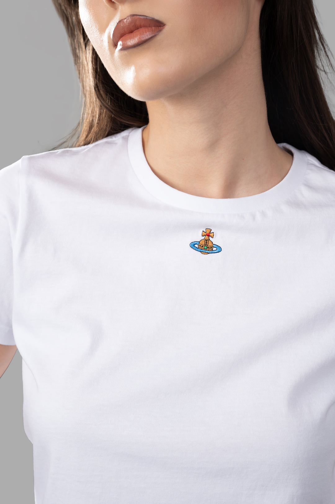 Vivienne Westwood Orb Logo T-shirt in White features an embroidered logo on the chest, styled with a crewneck and short.