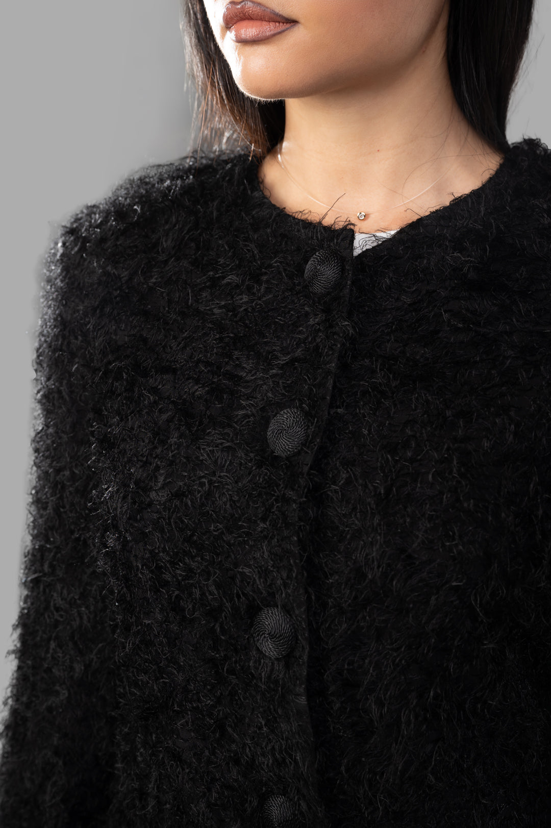 By Malene Birger Susenne Textured Cardigan in black, showcasing soft, fluffy texture and button fastenings on model.