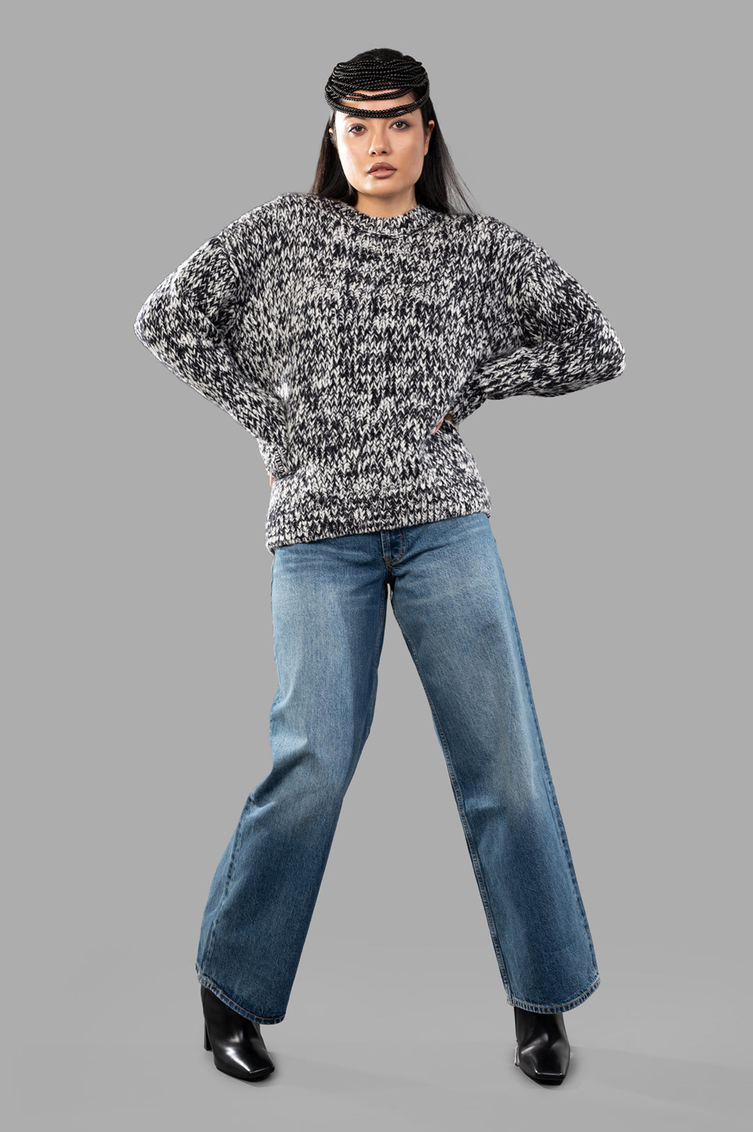 Anine Bing Manon Jeans in vintage blue on model, showcasing wide-leg cut and classic five-pocket design.