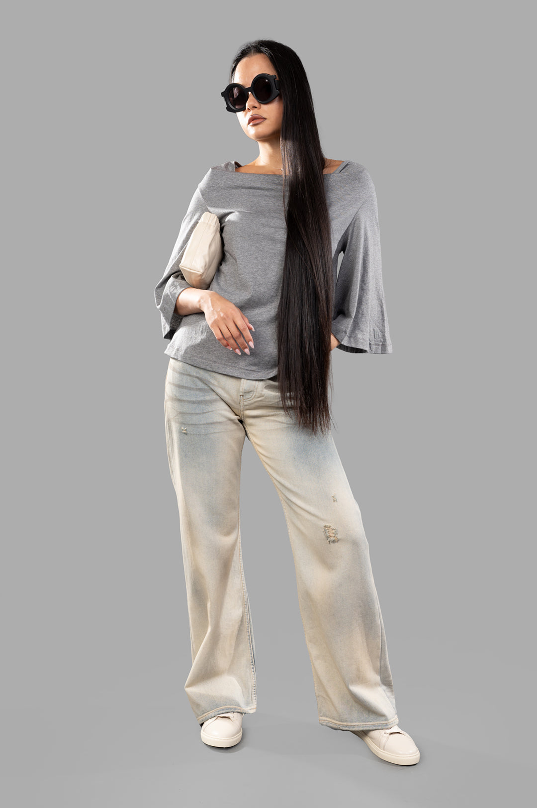 By Malene Birger Bryar Cotton T-shirt, front view on-model with long hair, oversized sunglasses, and casual pants.