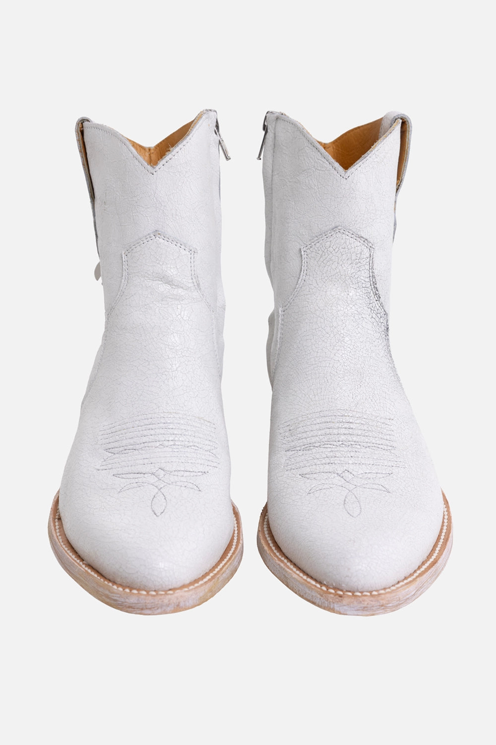 Comme des Garçons x Mexicana women's western ankle boots in white, front view with stitched vamp and tapered toes