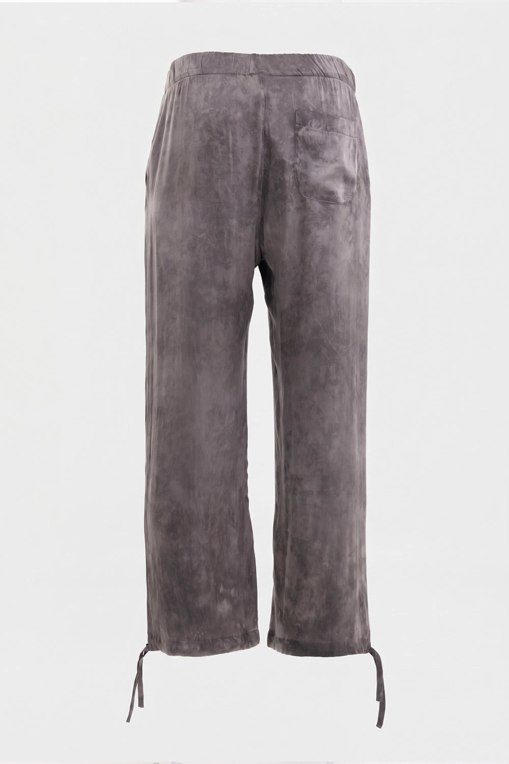 Avant Toi unisex wide-leg silk jogger pants in Fango, back view with single patch pocket and hem ties