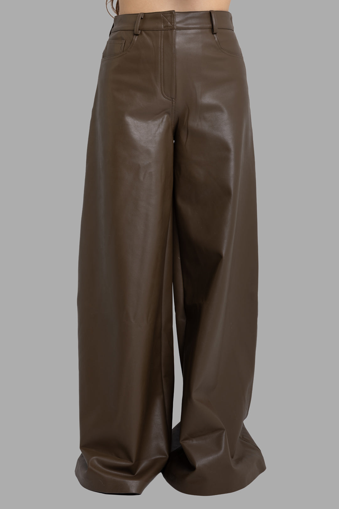 Norma Kamali women's bark vegan leather wide-leg pants, front view showing high waist and smooth five-pocket styling.