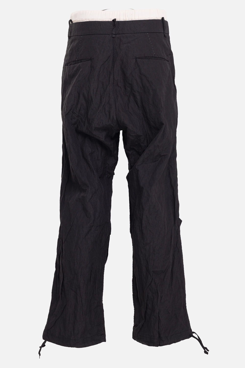 Masnada men's wide-leg pants in black, back view, rear slit pockets and low-crotch shape