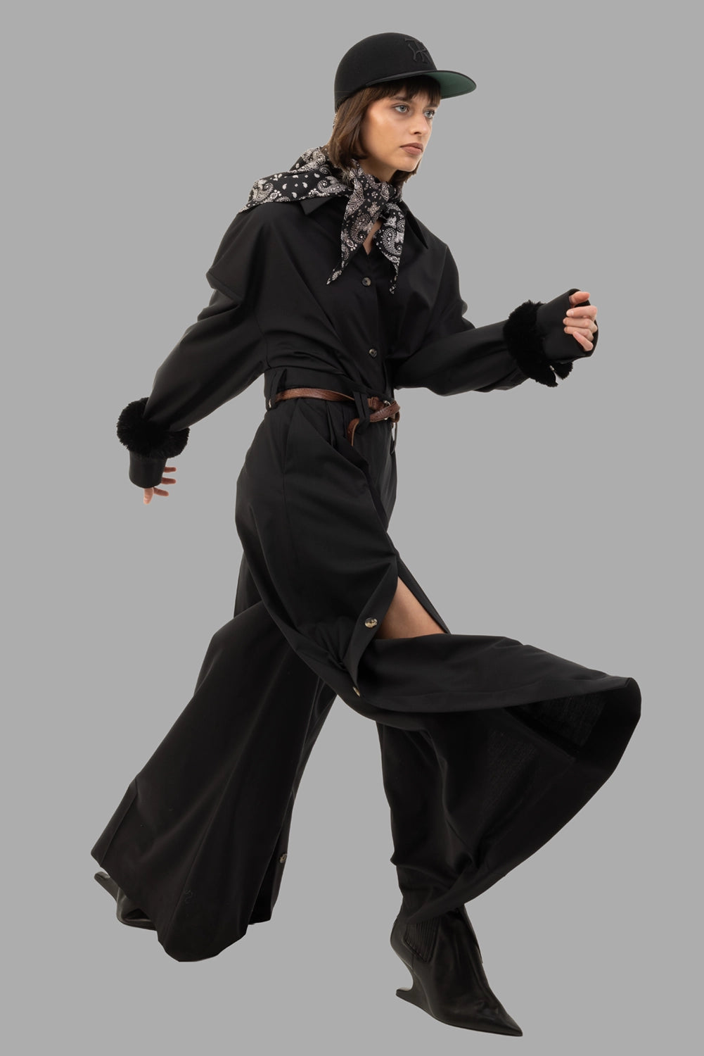 A.W.A.K.E. MODE women's wool wide-leg pants in black, on-model full length, dramatic full side slits with buttons