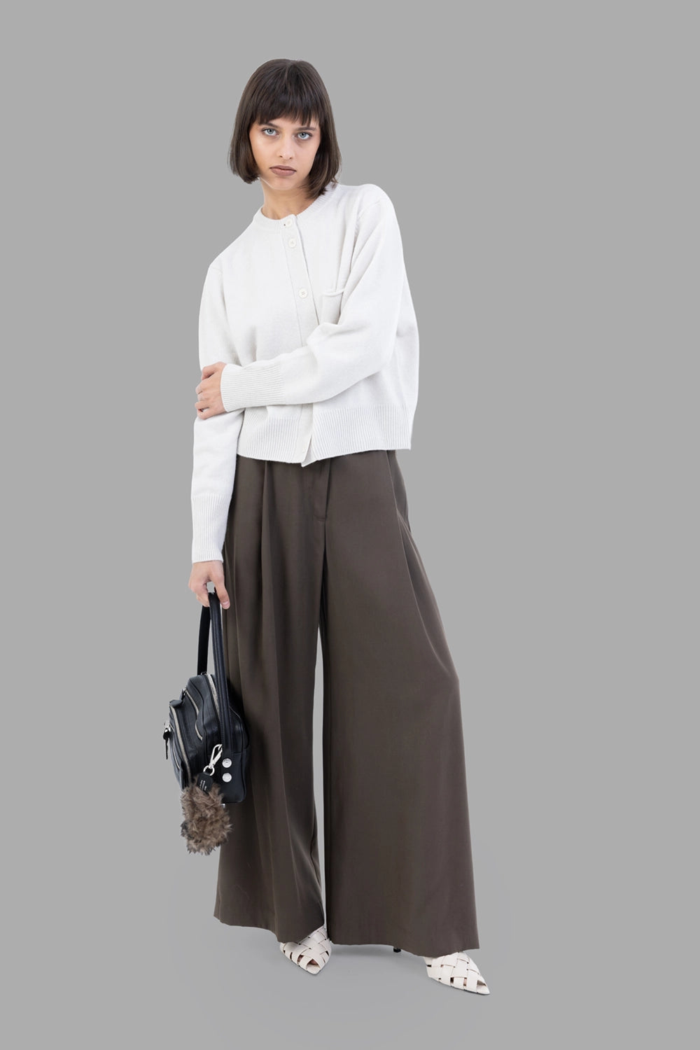 Gentry Portofino women wide-leg pleated trousers in Mastice, on-model full length, high waist, fluid drape