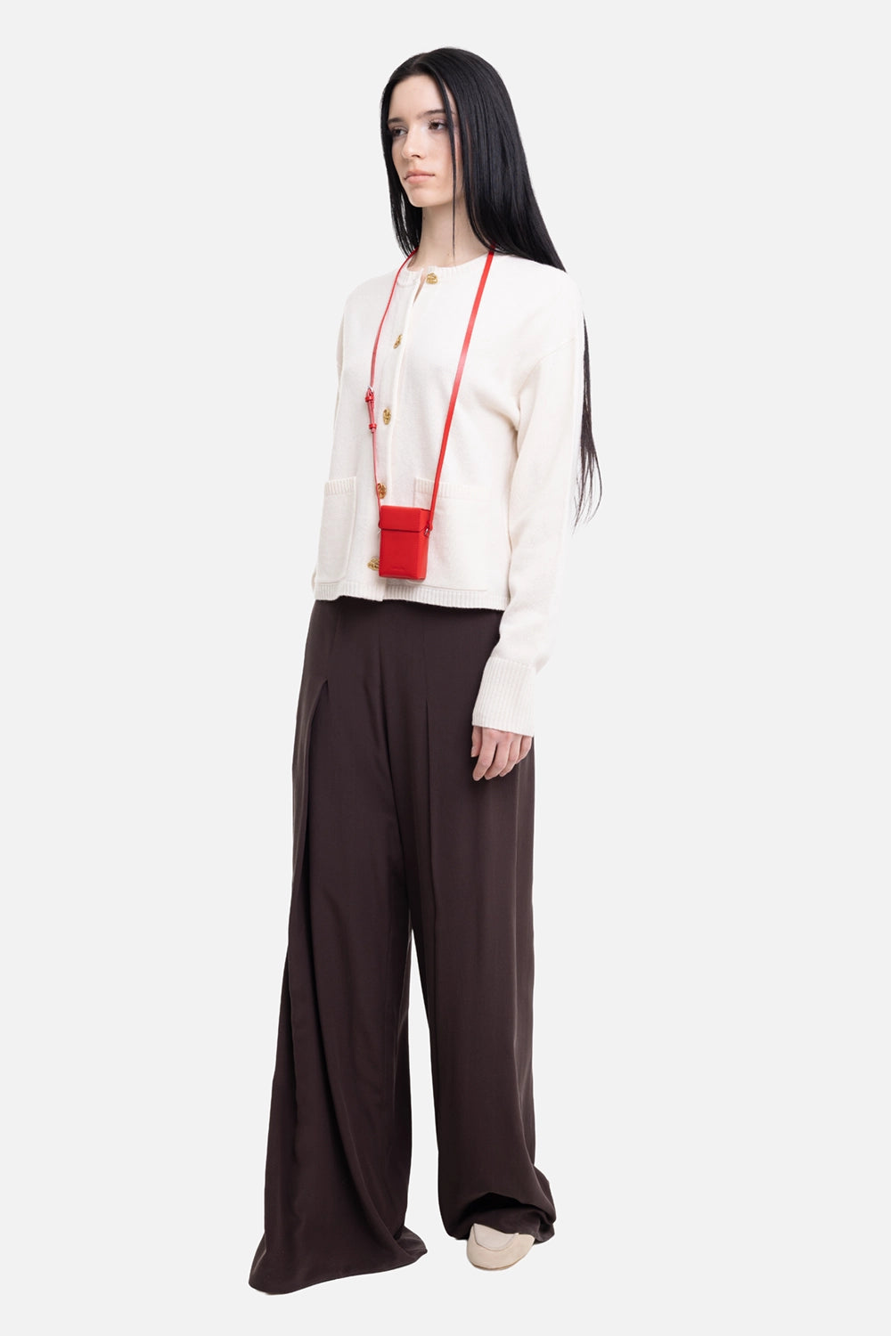 By Malene Birger women's wool cardigan in soft white, on model full-length side view, dropped shoulders