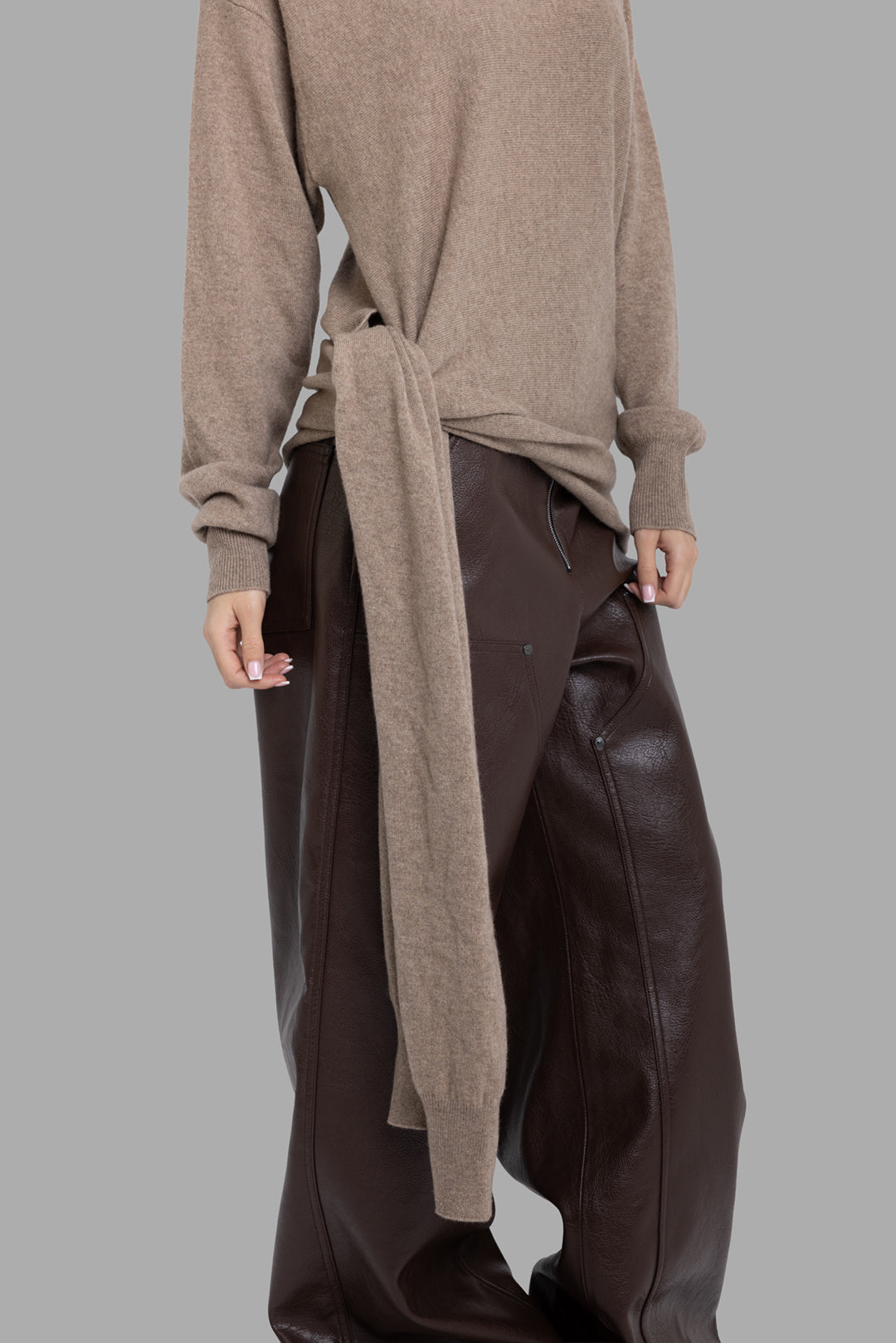 Uma Wang women's tan cashmere wrap top, close-up side view with long self-tie panel wrapped at the hip