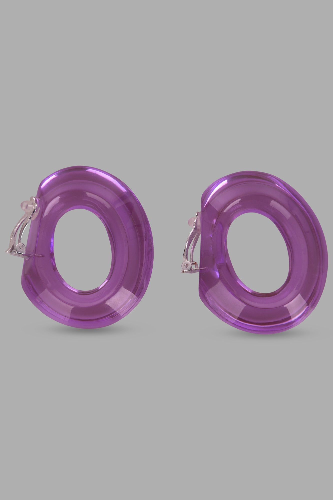 Monies Purple Earclips featuring 80s-inspired design, made with polyester and silverplated brass, side view.