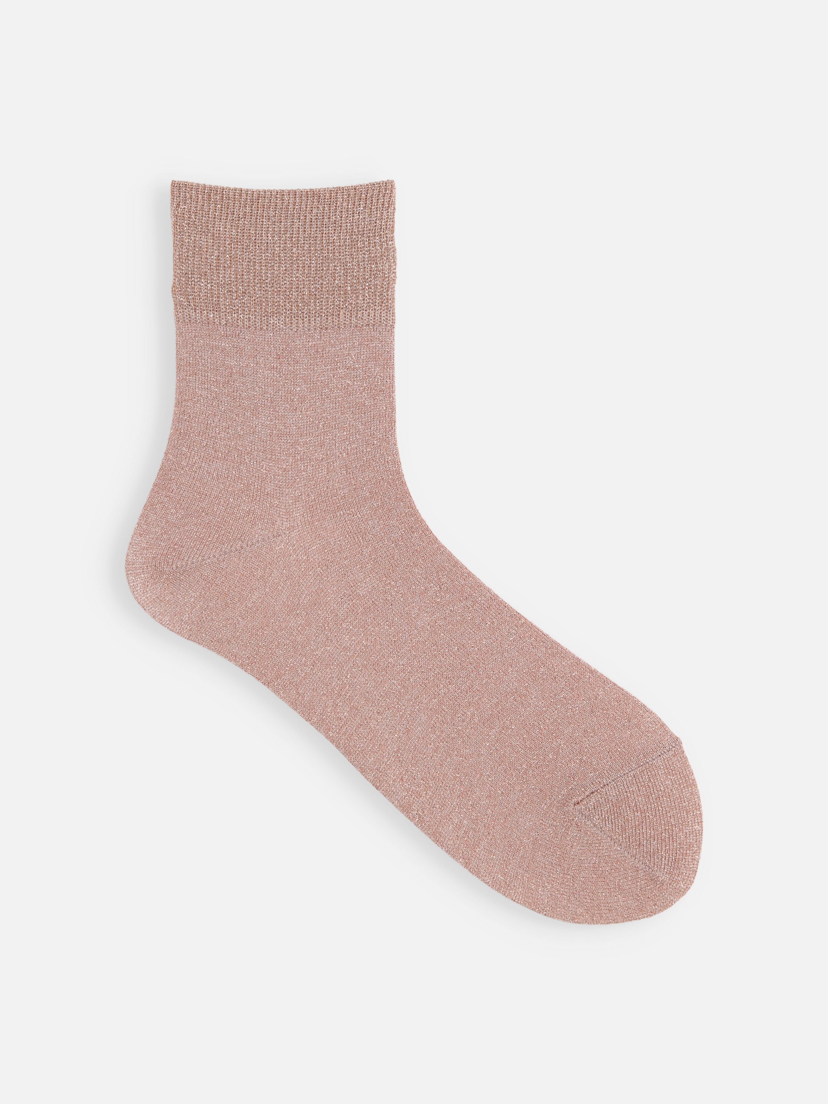 Tabio Sparkly Ankle Socks in soft pink. Calf-length with a glittery texture, perfect for dressed-up or casual outfits.