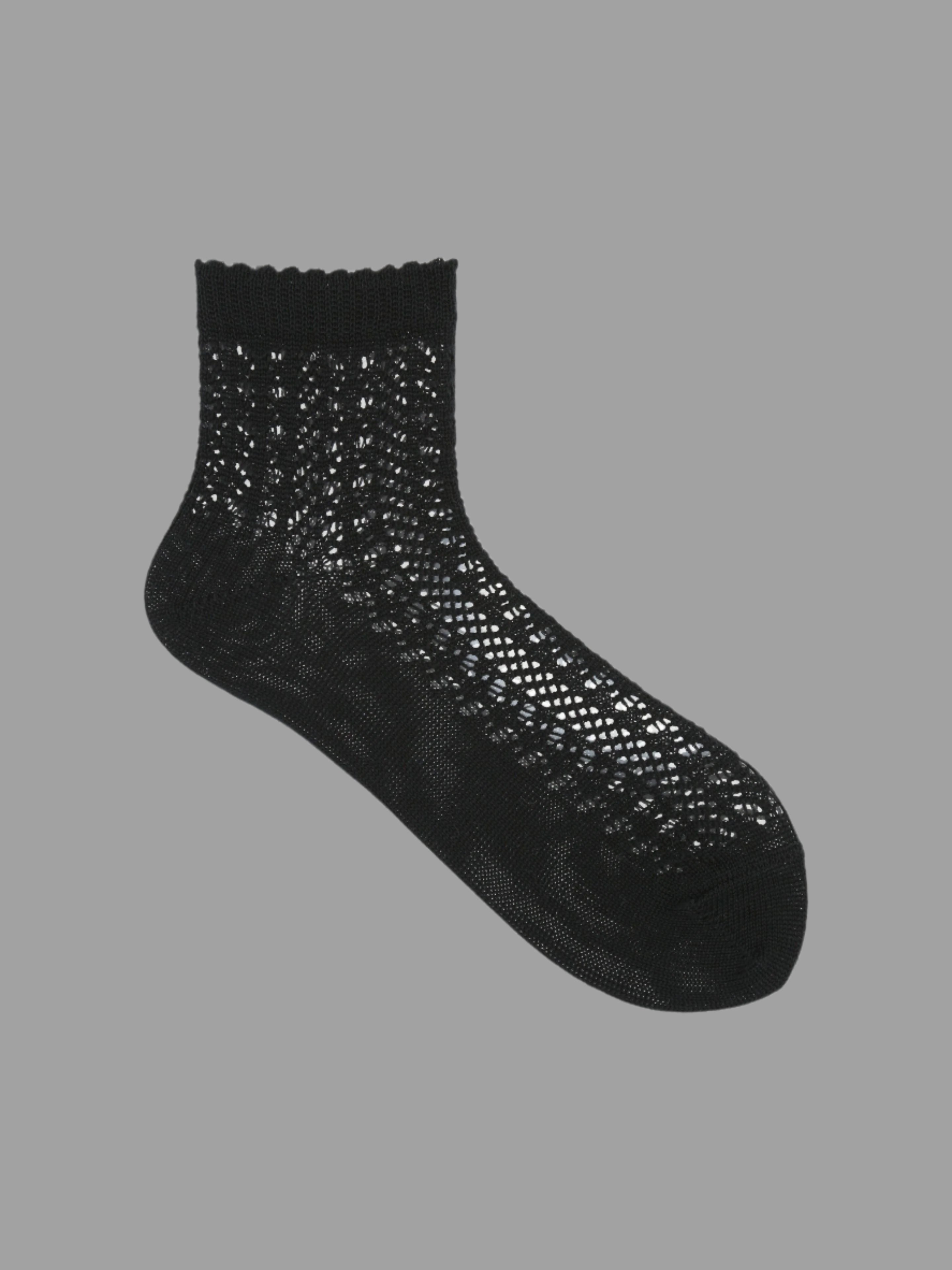 Tabio Irmack Mesh Ankle Socks in black, side view showcasing intricate lace pattern, ideal for a feminine look.