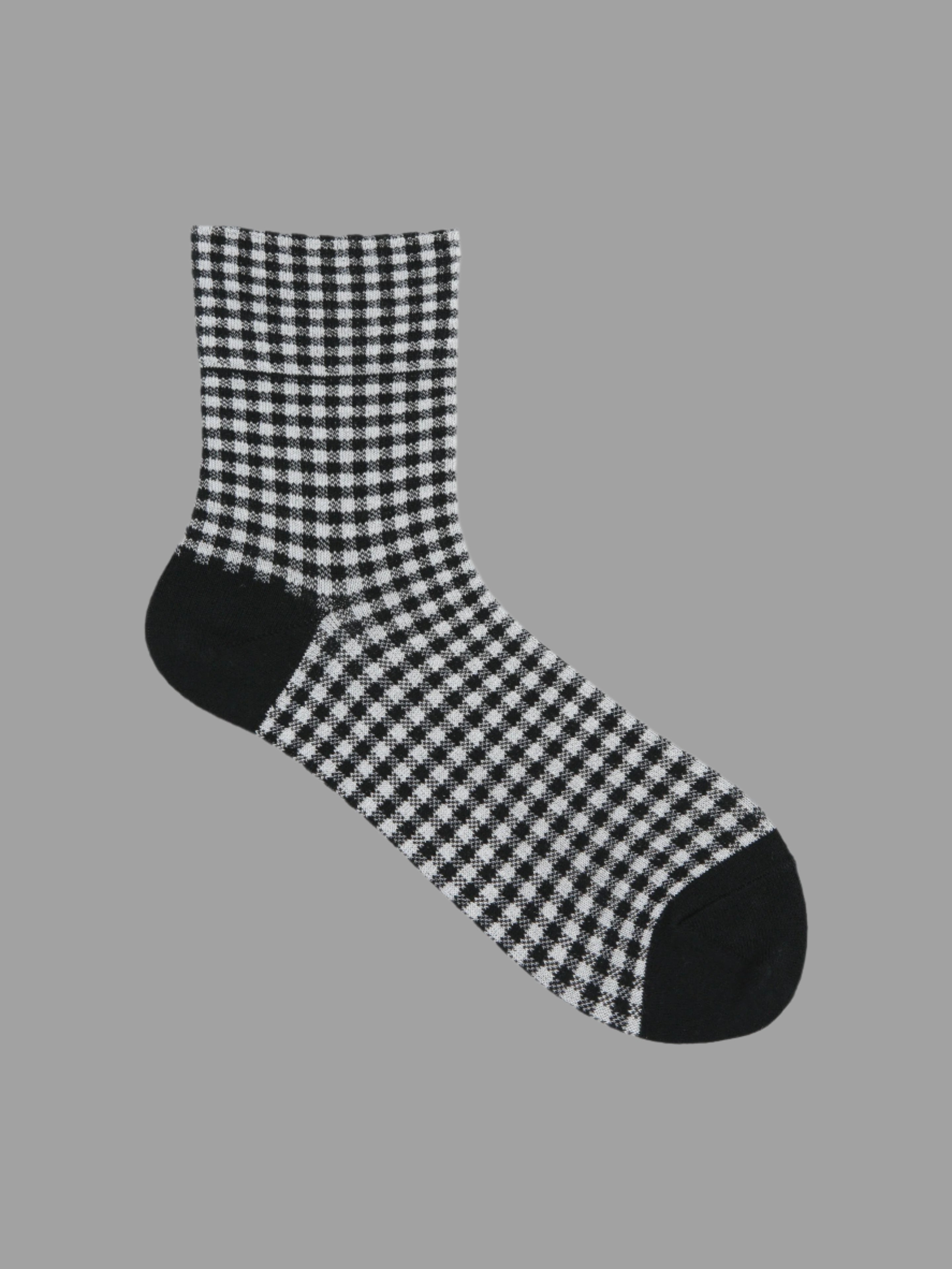 Tabio Vichy Checkered Socks in black/white, side view. Made with mercerized cotton for durability and style.