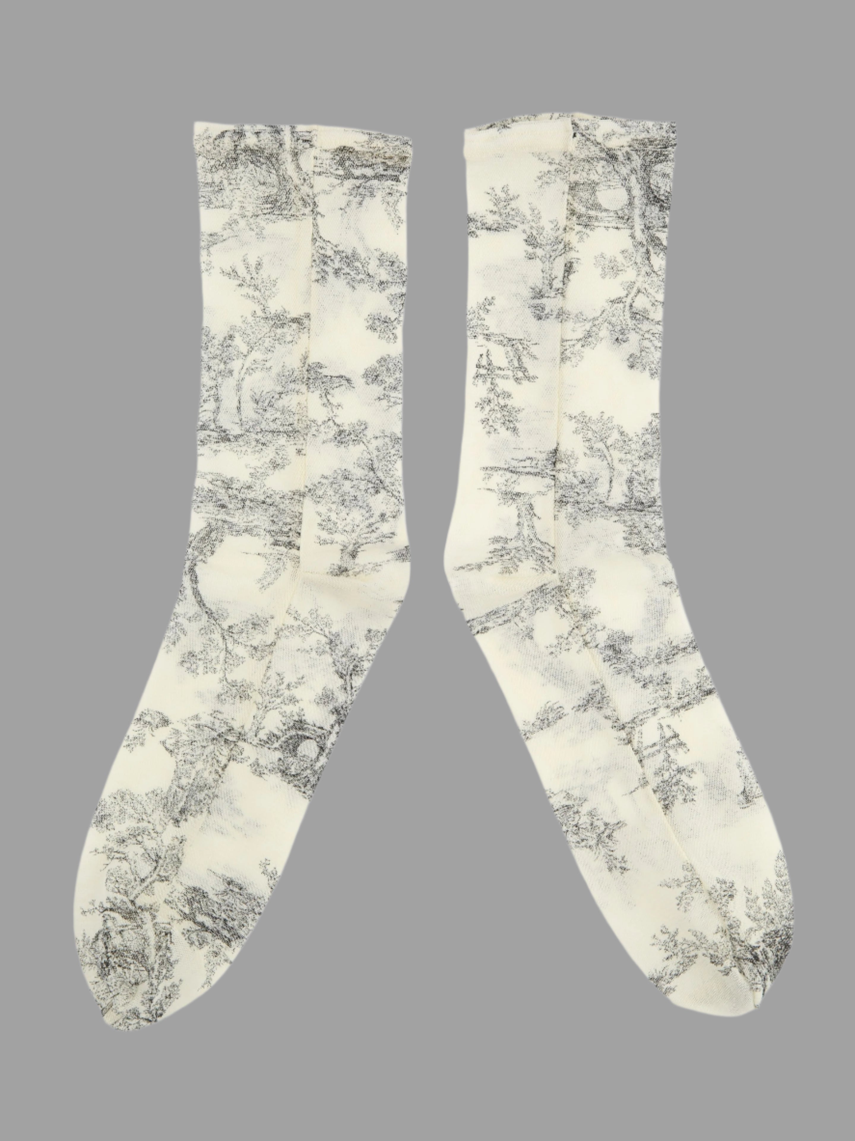 Tabio. Sheer Toile De Jouy Crew Socks featuring an elegant toile print in black on a soft cream background.